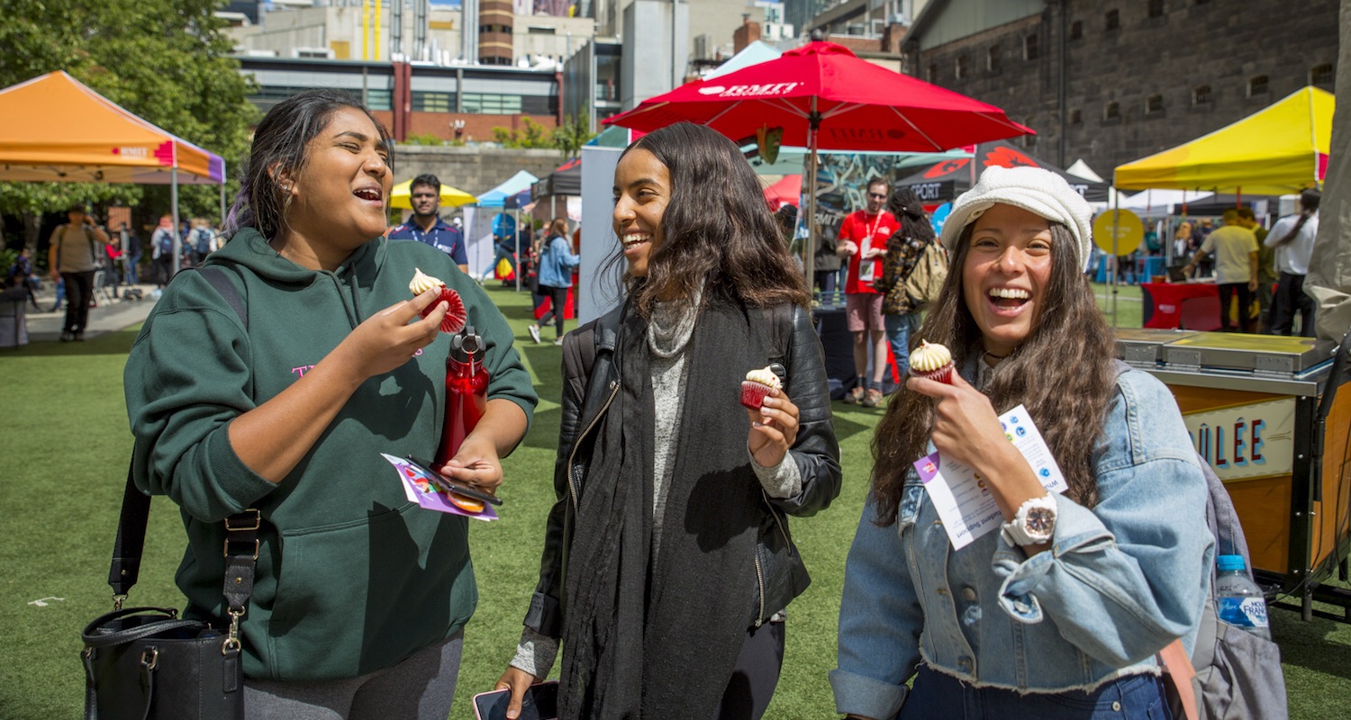 Students eating cupcakes