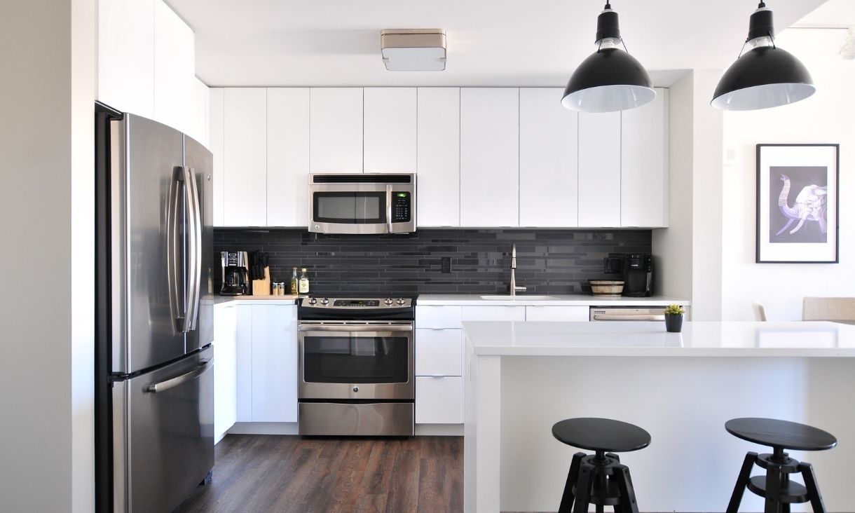 A kitchen area in an apartment.