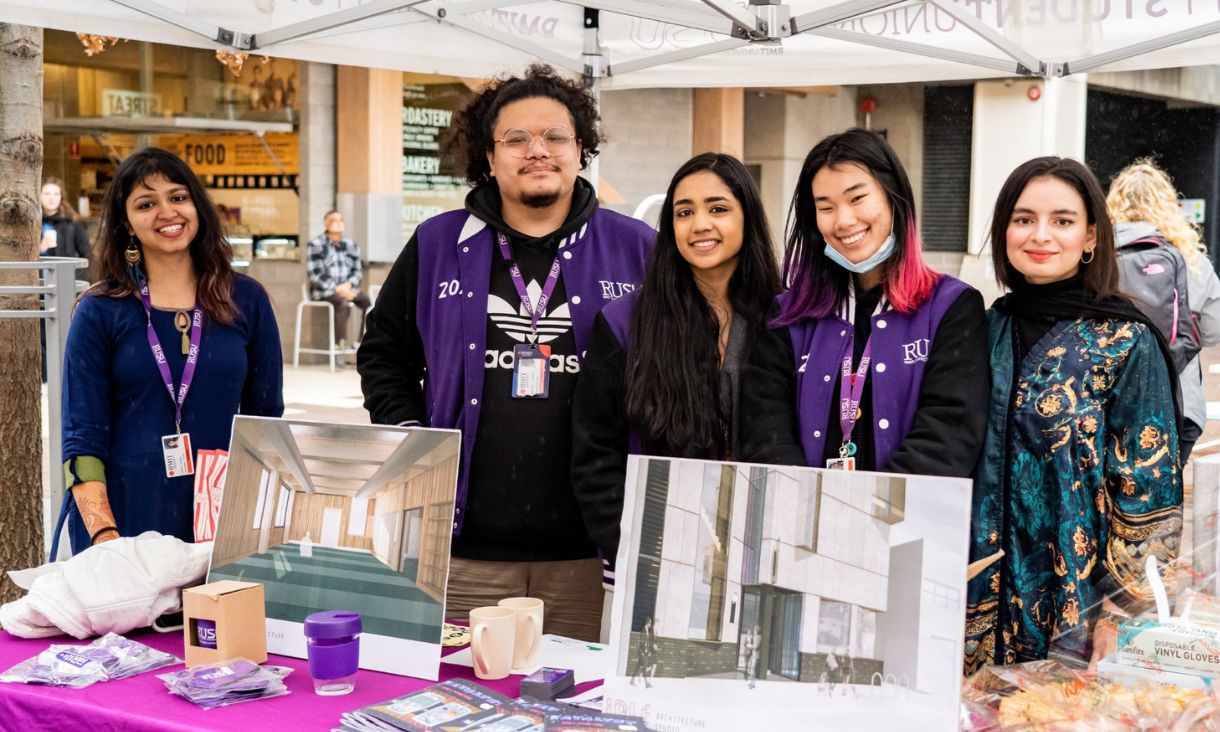 RUSU union council staff pictured with RMIT’s Multi-Faith Centre plans 