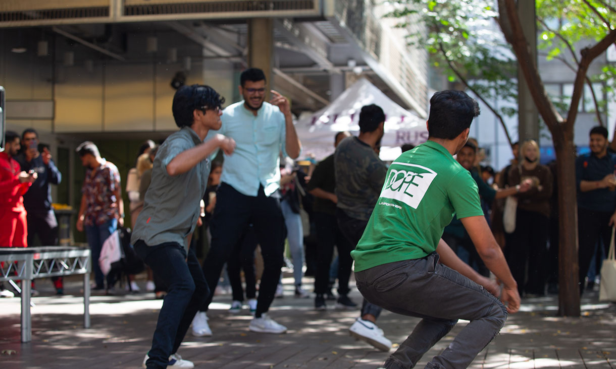 Male students dancing at RUSU's multicultural festival