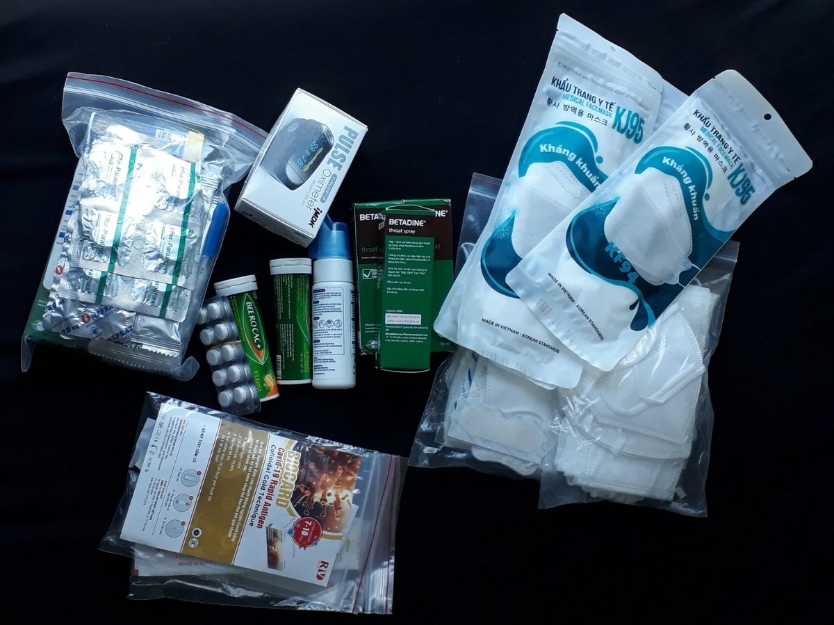 Items for travel including Berocca, medicine, face masks etc.