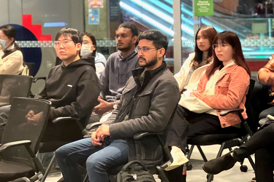 Students listening in on Christies' presentation 