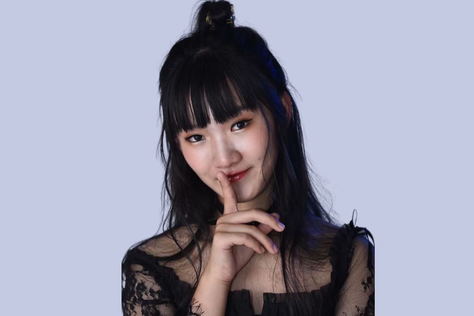 Ruisi Chen  smiling toward camera 
