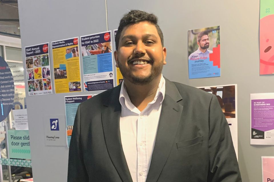 Viraj Navin Wijethilaka Mangappulige Don, smiling toward camera 