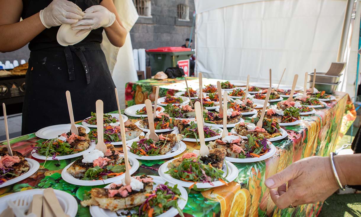 A table with plates of food.