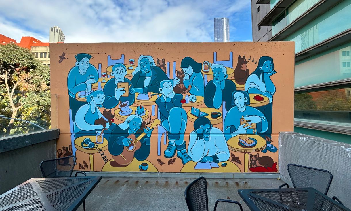 Mural depicting blue and yellow people