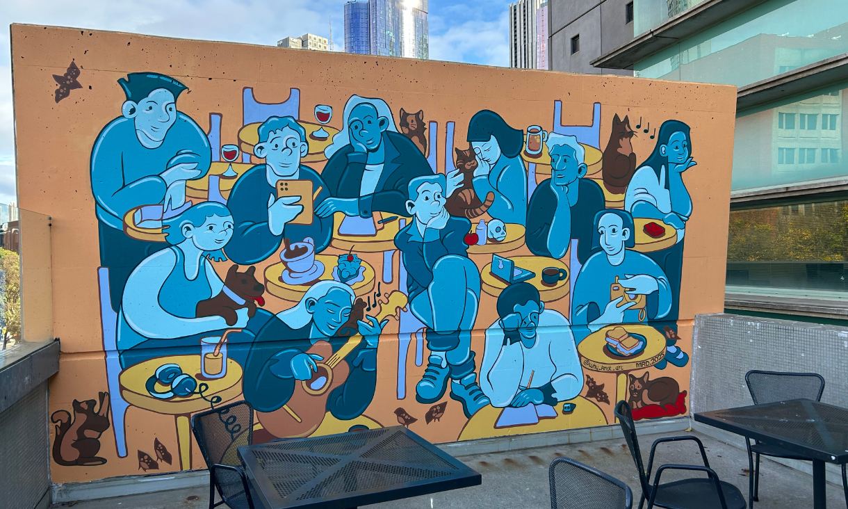 Mural depicting blue and yellow people