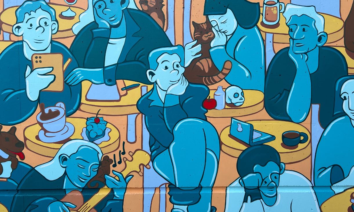 Mural depicting blue and yellow people