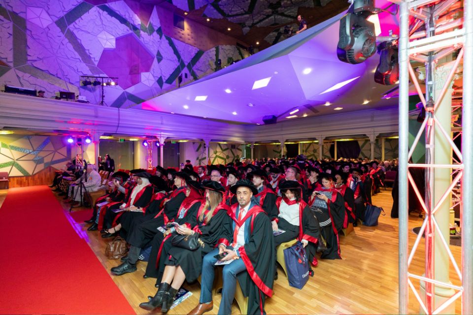 Graduates, academics and guests in attendance at the 2025 Doctoral Degrees Graduation Ceremony at Storey Hall, RMIT City campus.