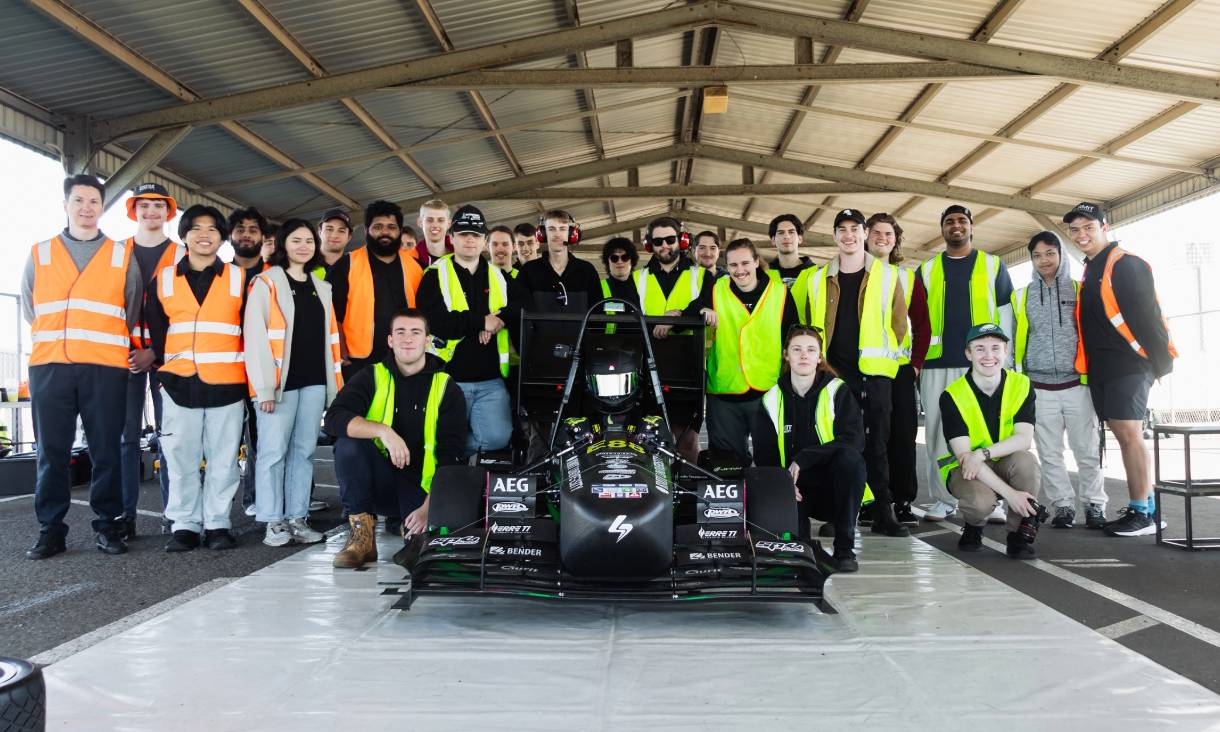 The RMIT Motorsport team with the car