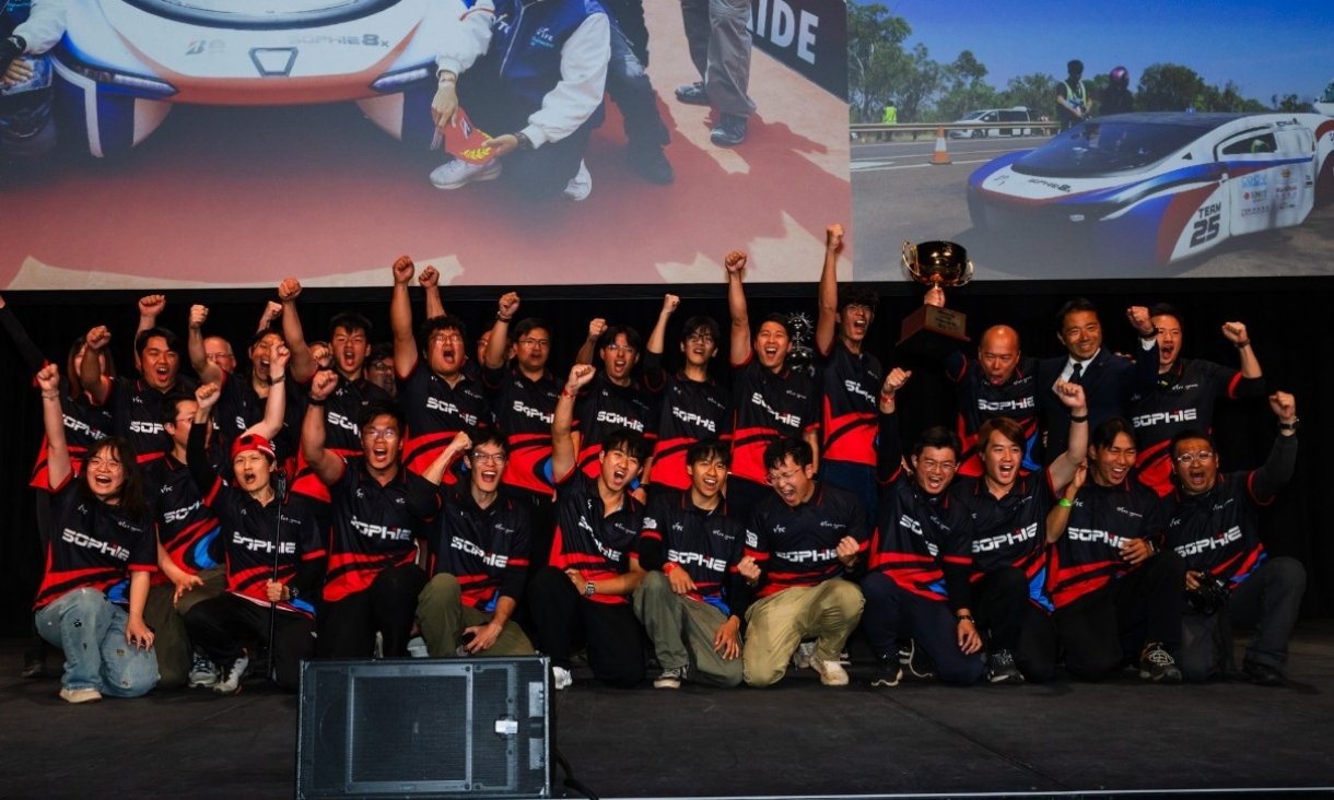 Group of people celebrating on stage