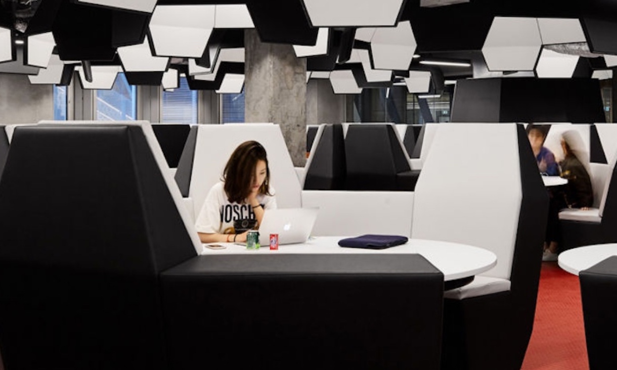 Students in library study space