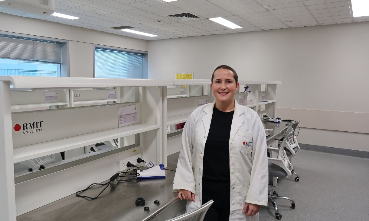 Person wearing labcoat in lab