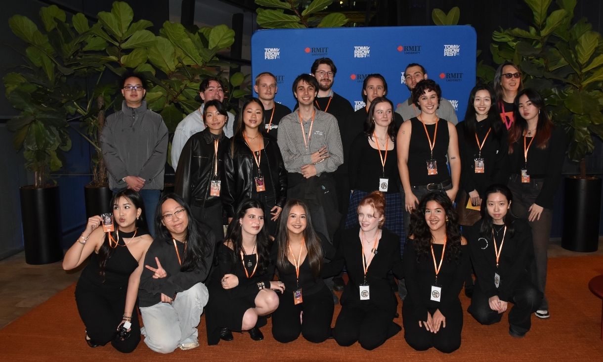 People standing on red carpet