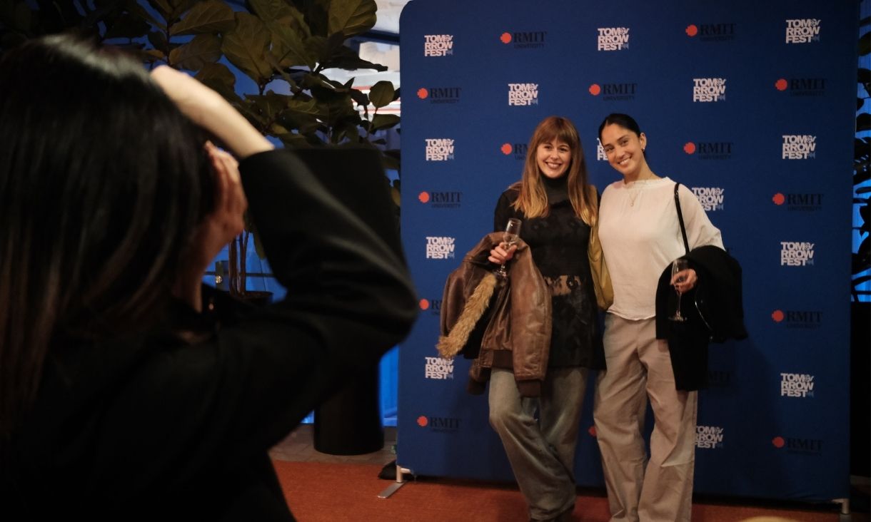 Two people posing for camera 