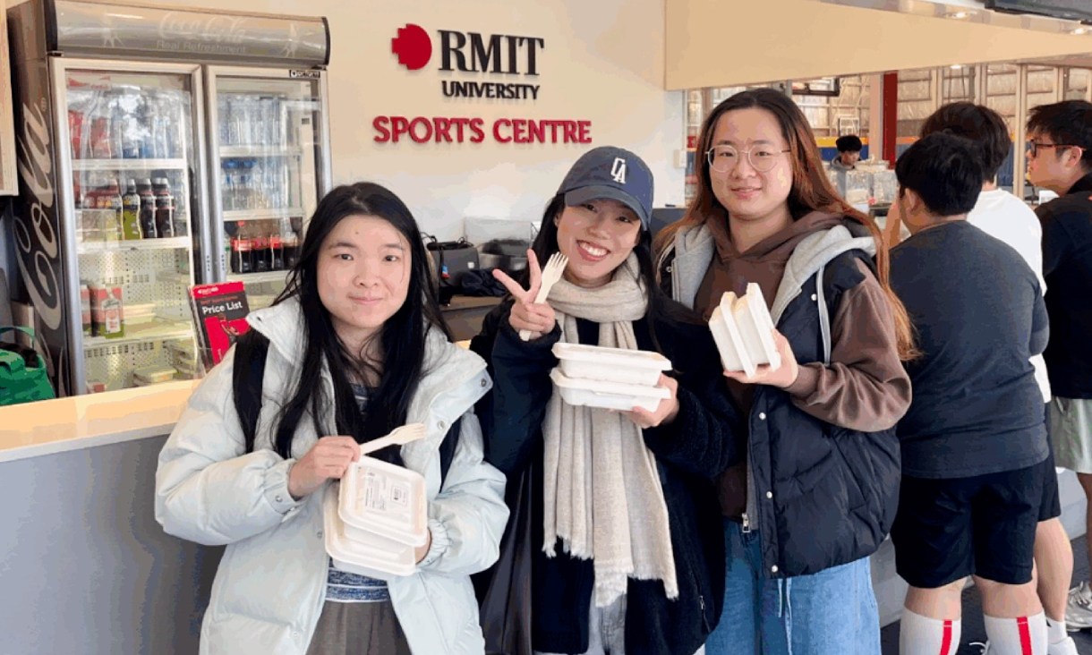 Students eating food at RMIT Bundoora Sports Centre Cafe