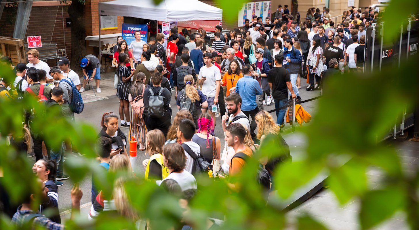 Students gather together during an event at the City Campus.