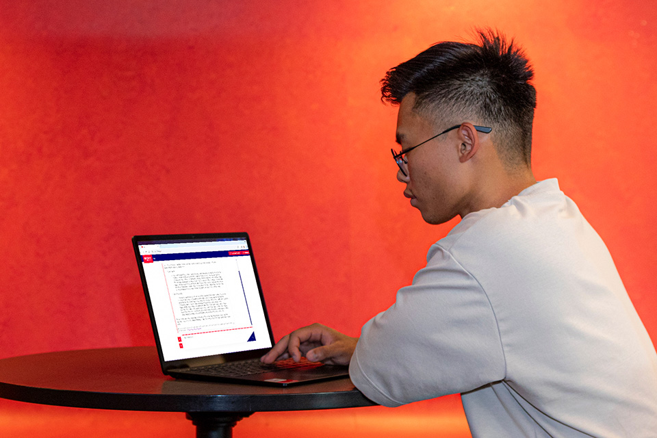 A student uses Val on a laptop