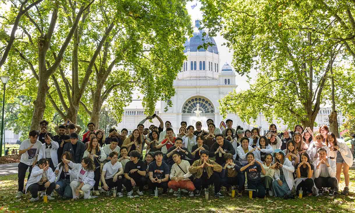 People lining up to have their photo taken.
