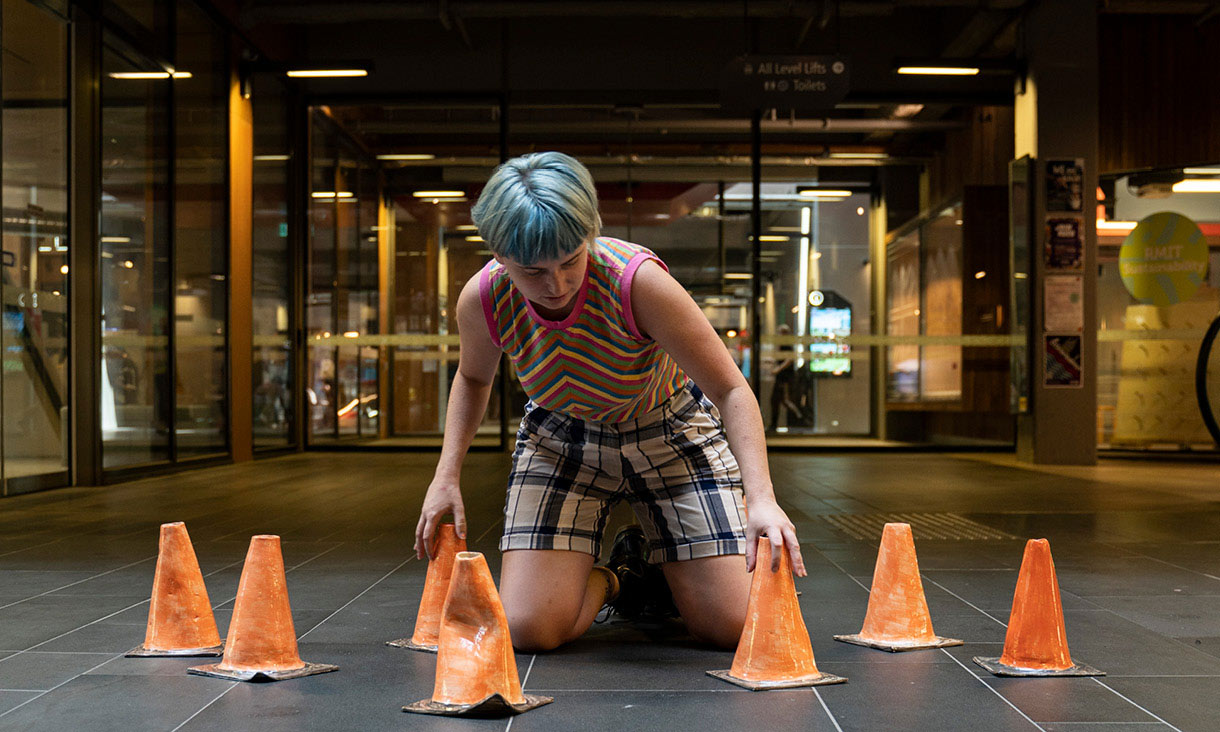 Person arranging traffic cones