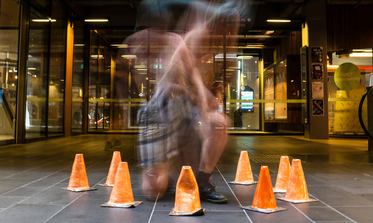 Person arranging traffic cones