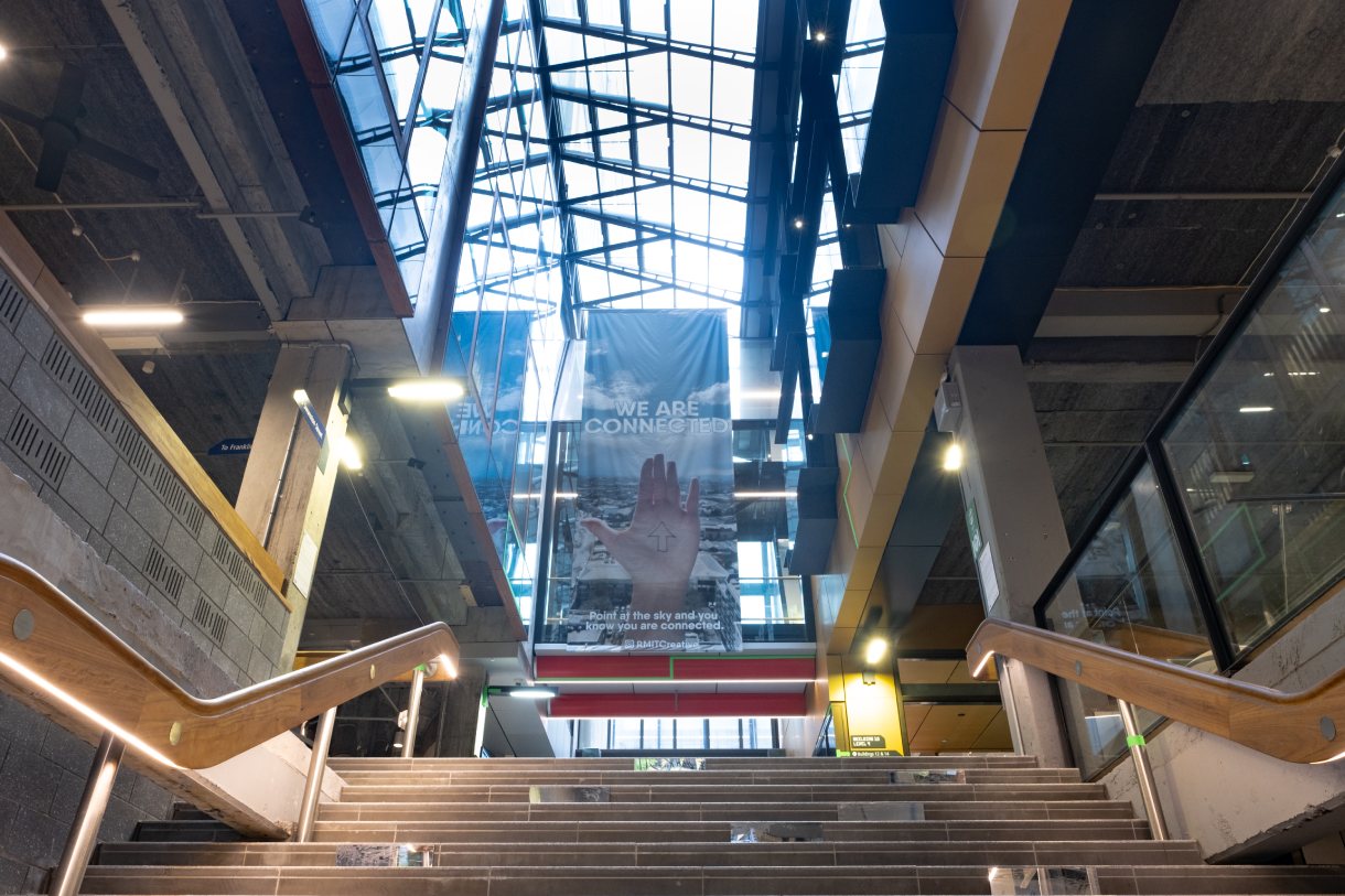 Wide shot of concrete stairs and hanging banner