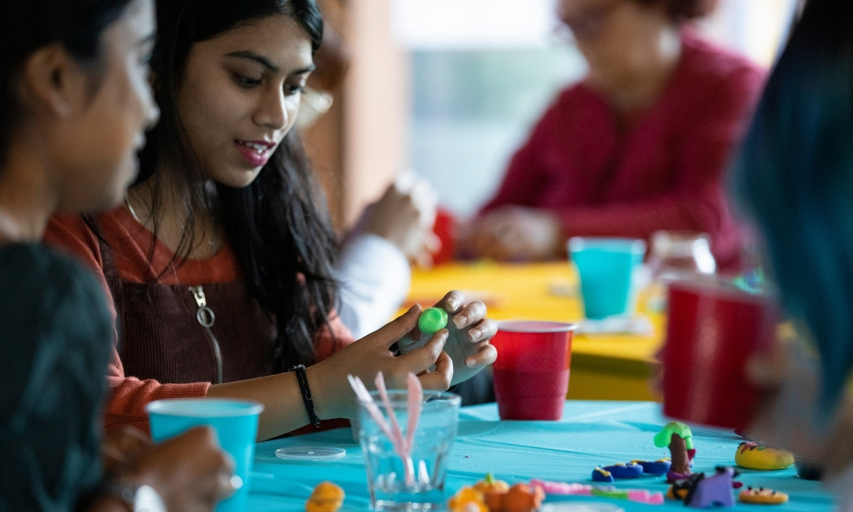 People making things with clay