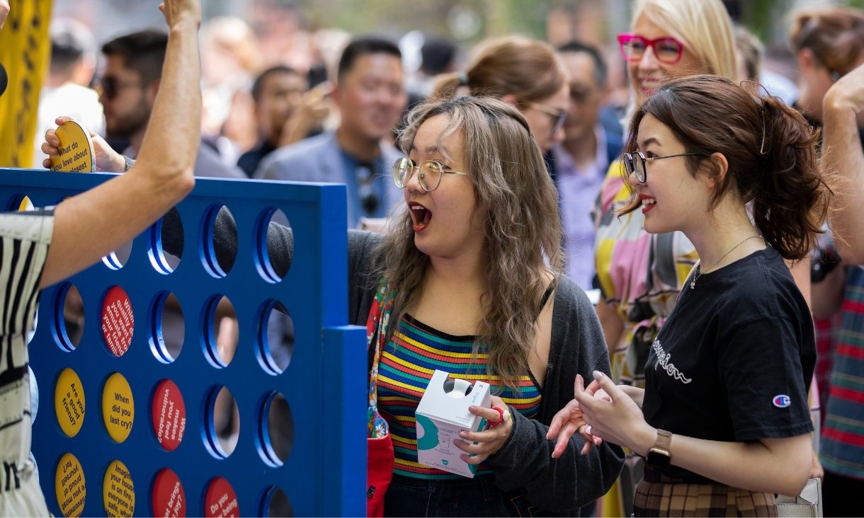 People playing connect 4 