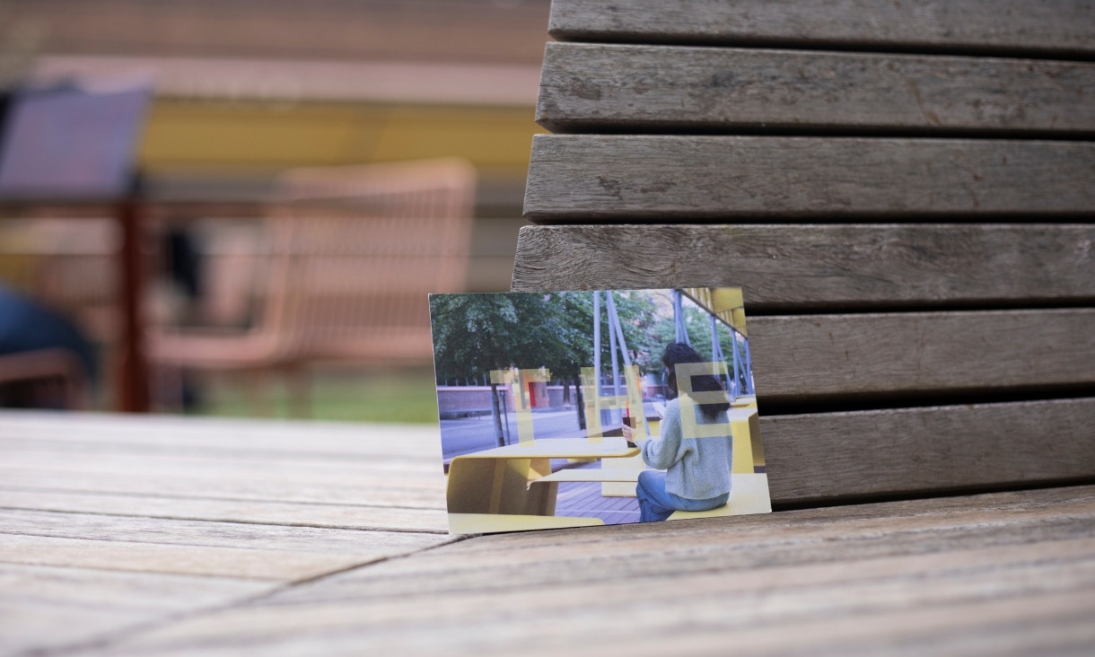 Photograph placed on wooden seat