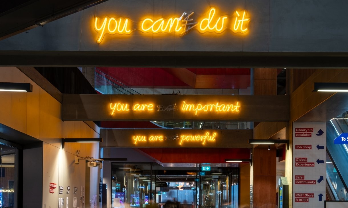 Neon light up signs on campus