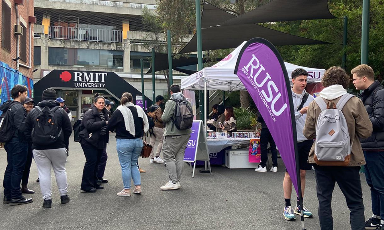 People standing in open space talking