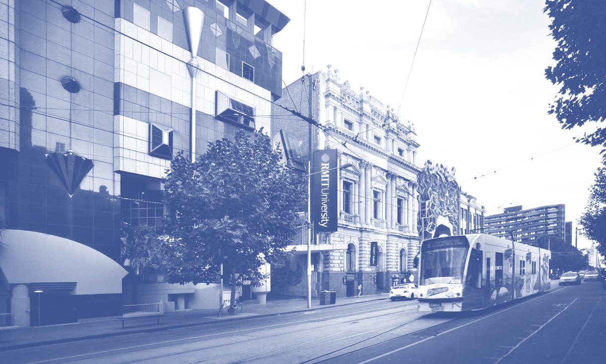 Black-and-white photograph of a tram travelling along Swanston Street outside RMIT City Campus.