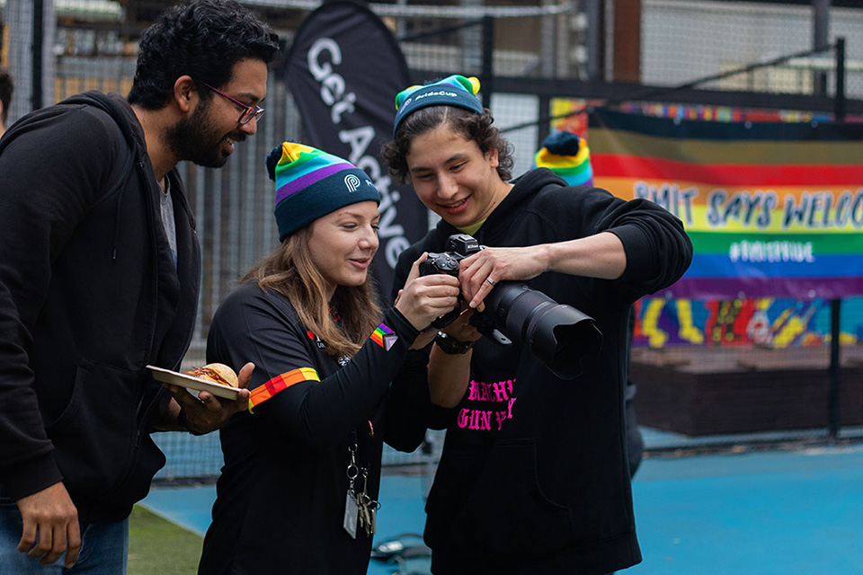 Students looking into camera screen