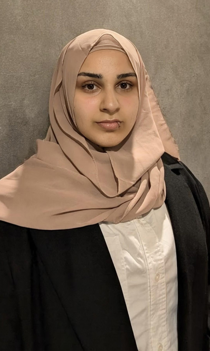Portrait of a woman wearing a hijab.
