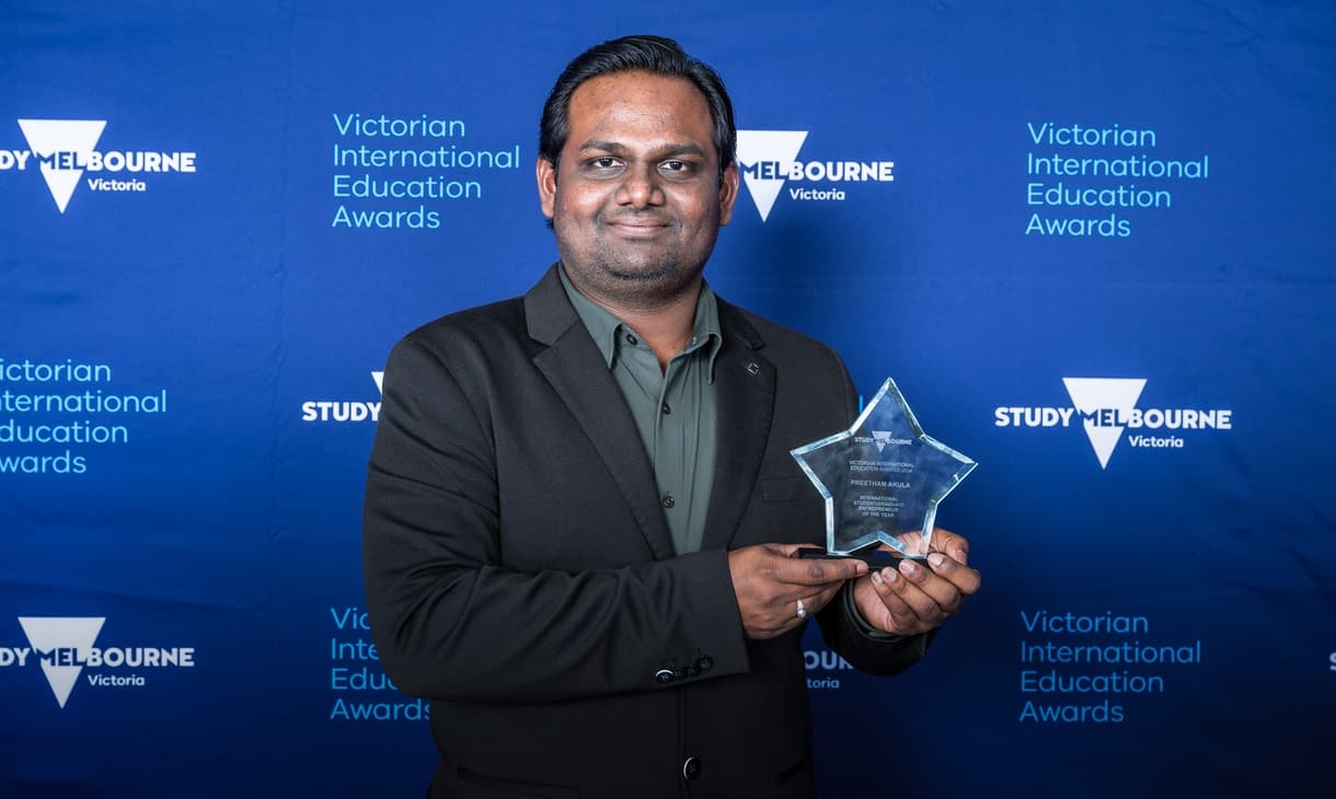 Preetham winning an award at VIEA
