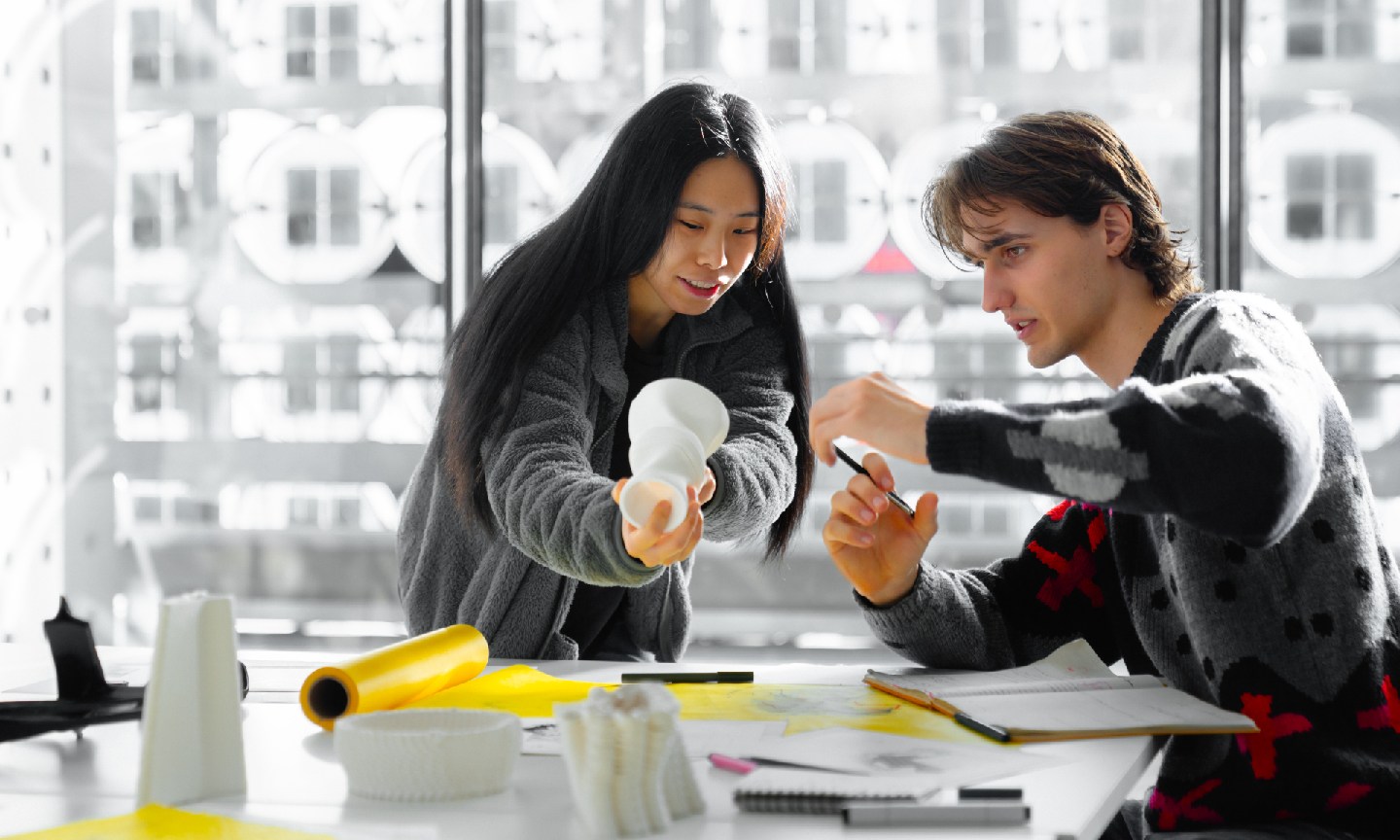 Two RMIT architecture students working on a project together