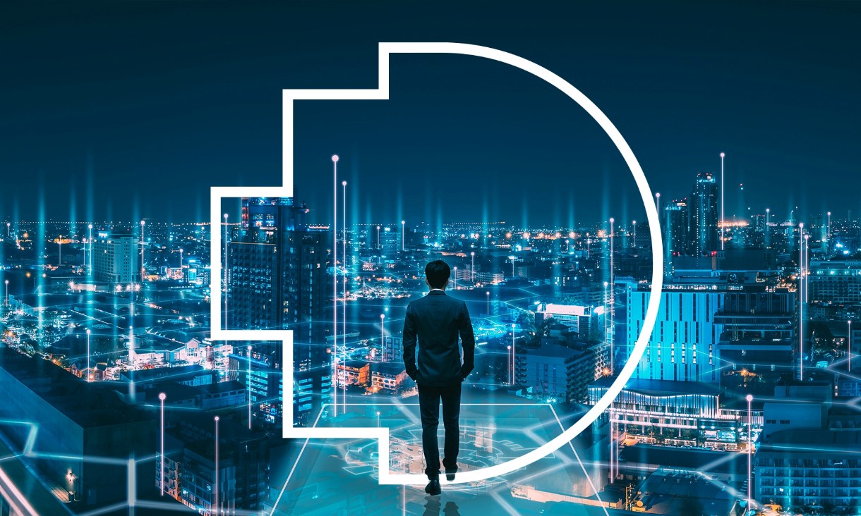 A man standing on a rooftop at night, overlooking a cityscape illuminated by digital lines and lights.