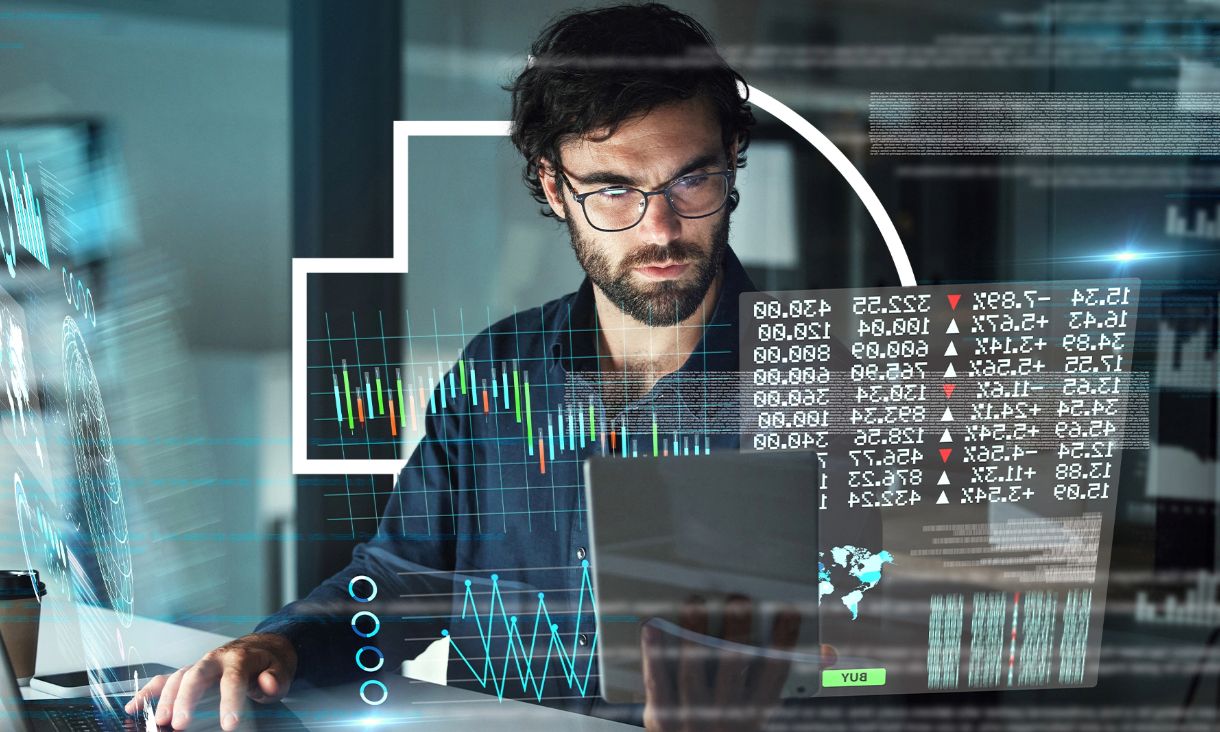 A woman in a blue shirt working in a server room, holding a tablet with digital code overlay.
