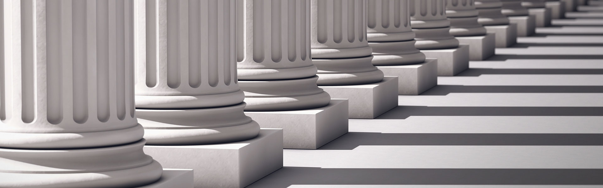 Roman columns casting shadows