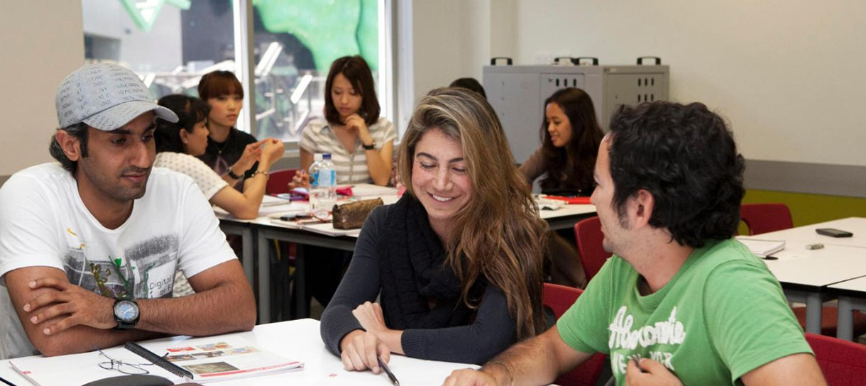 Students at a table in a classroom