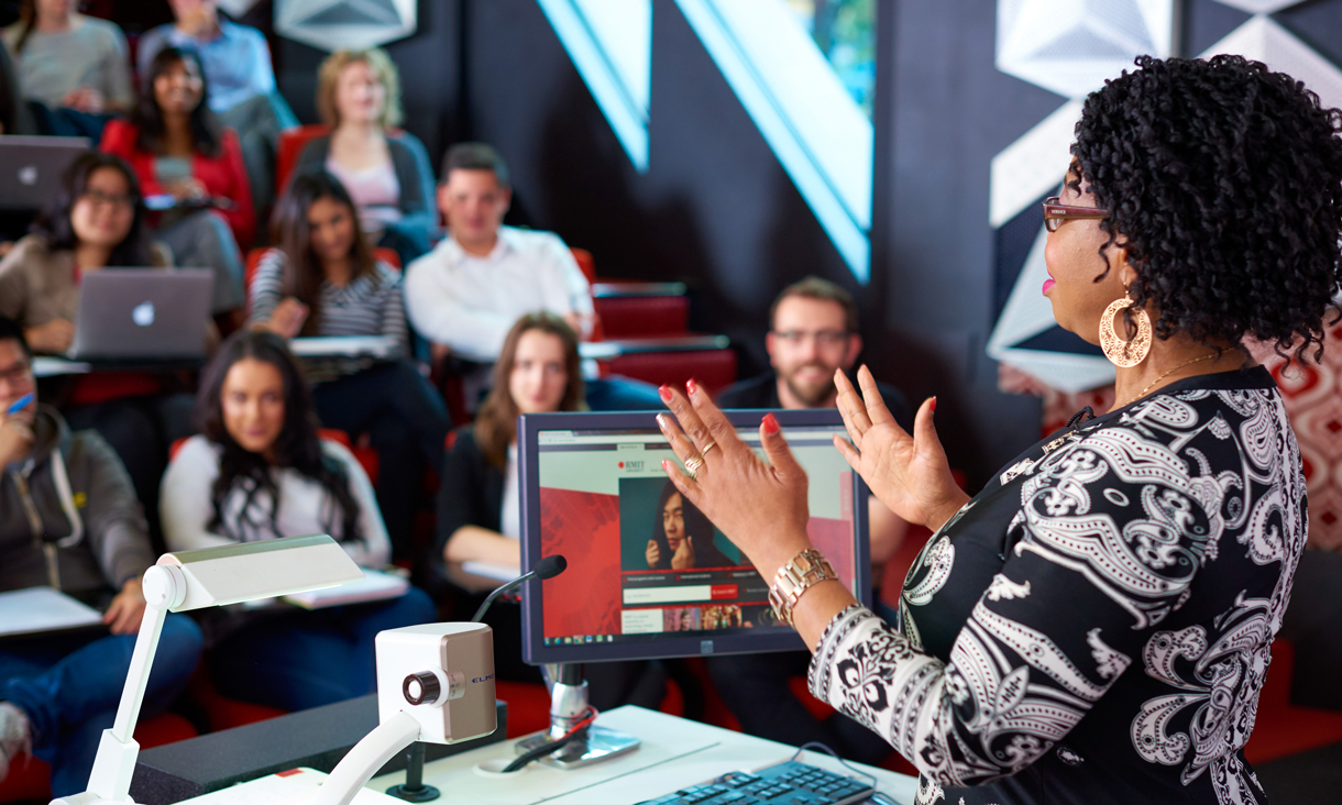 Lecturer addressing students