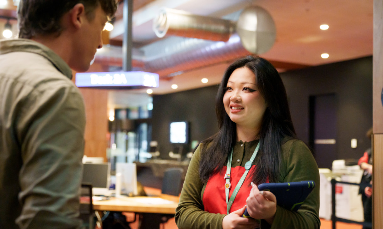 Support staff helping an RMIT student