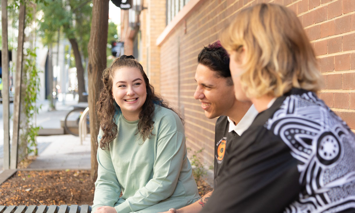 Postgraduate students in discussion