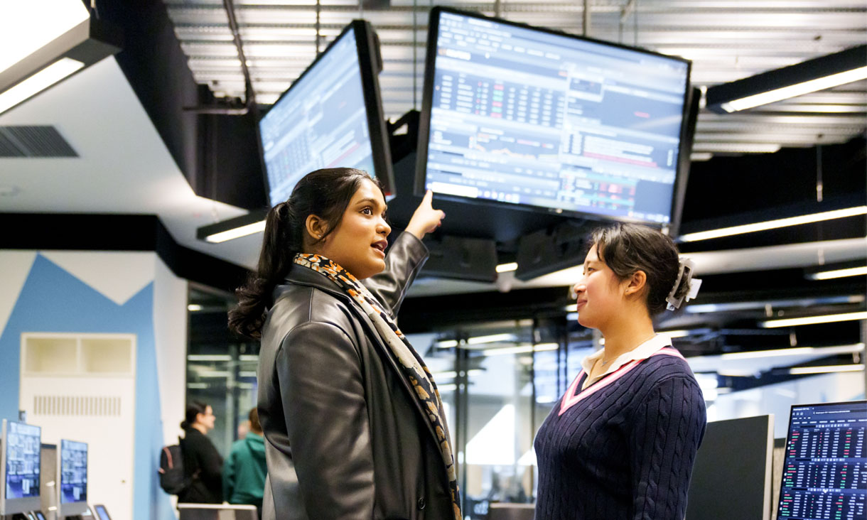 Two students in the RMIT Trading Facilities