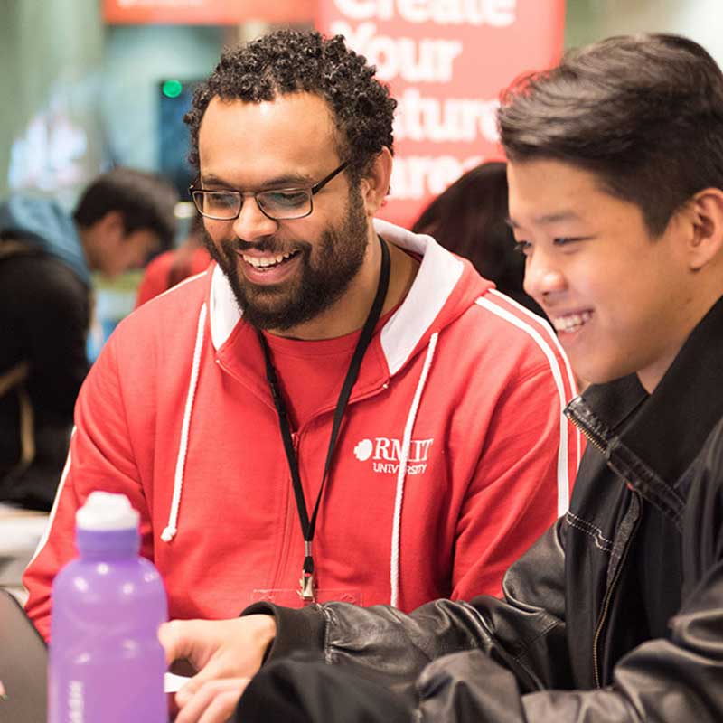 Job Shop employee helping student