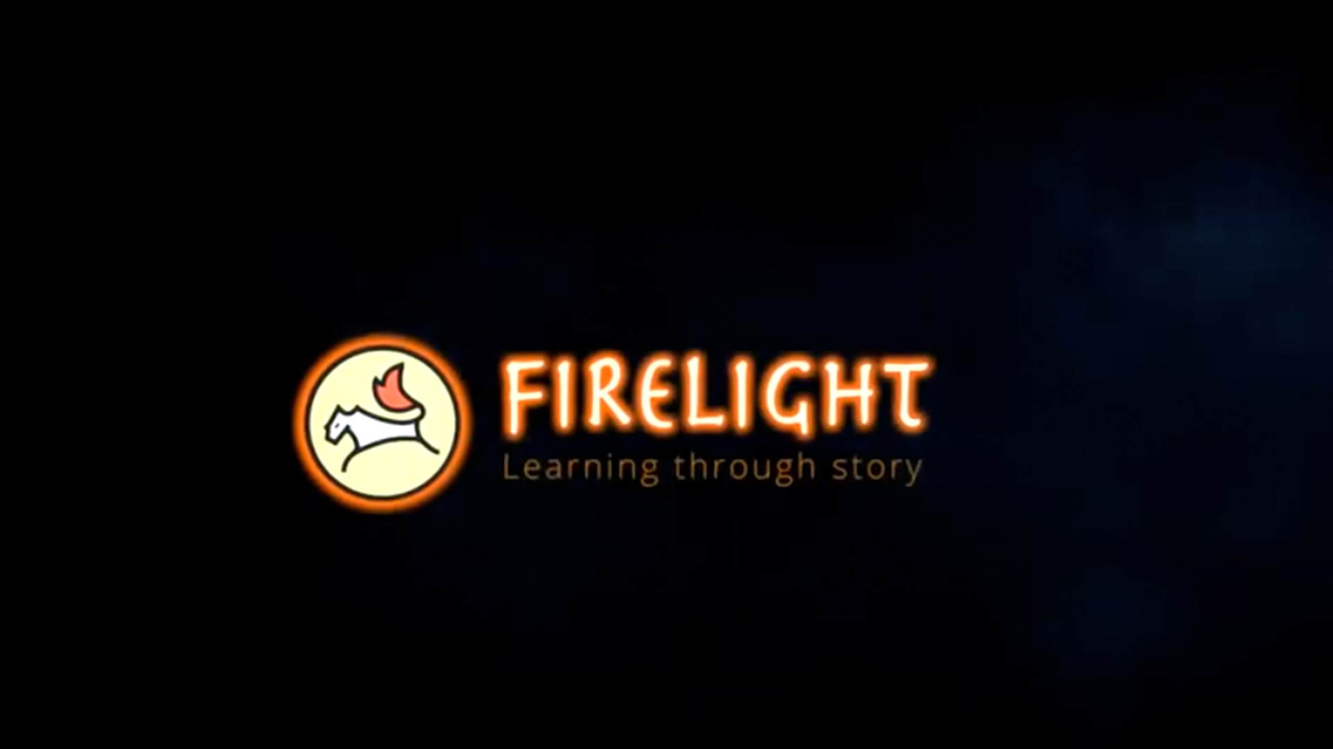 The words Firelight learning through story in orange on a black background