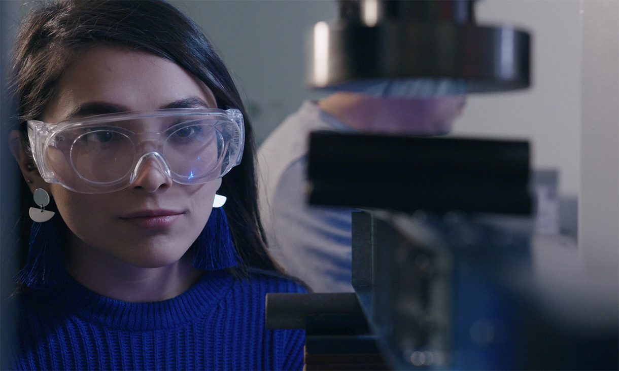Close up of Claudia Valle wearing safety glasses