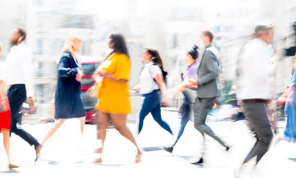 People crossing a busy road