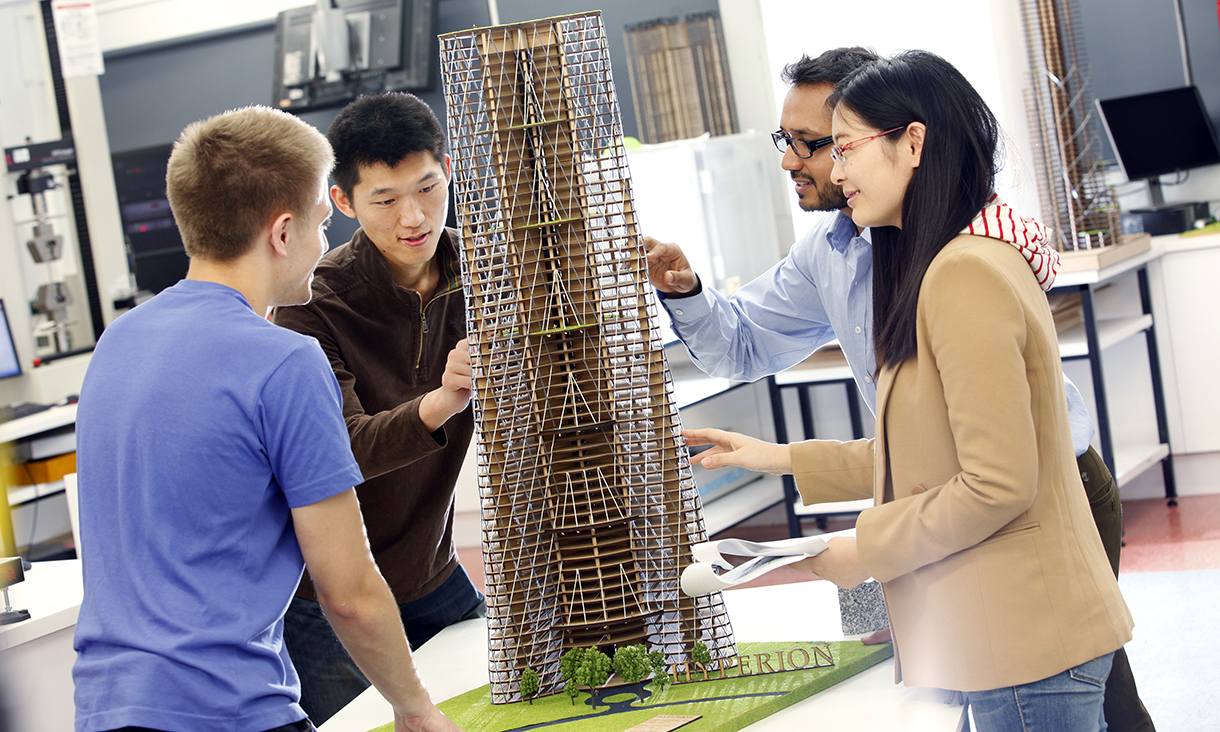 Civil engineering students assessing mock-up