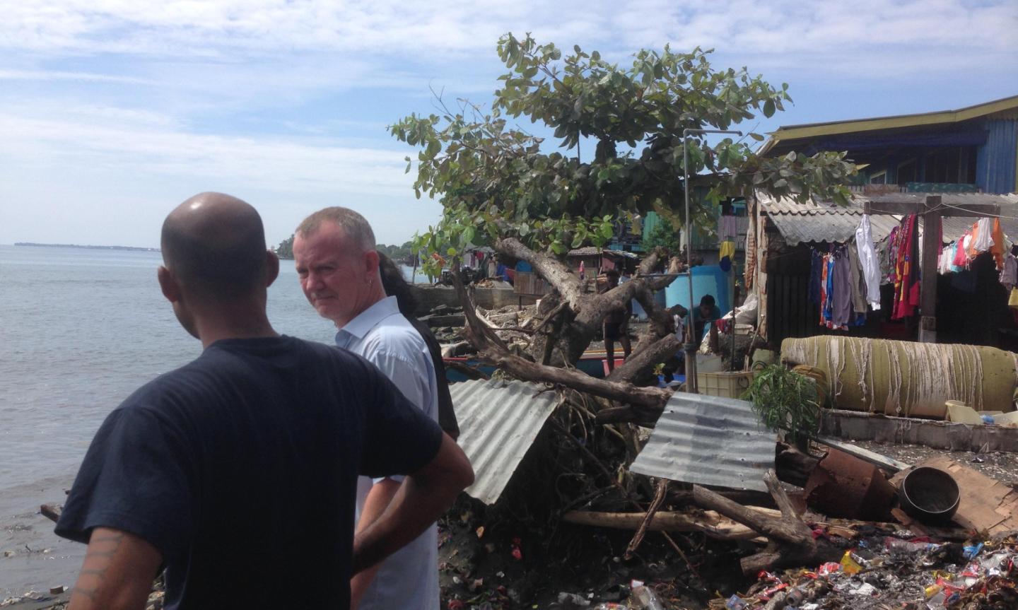 Leading_urban_resilience_and_climate_adaptation-Professor_McEvoy_with_informal_settlers_in_Ontong_Java_Honiara-RESEARCH-1440x865.jpg